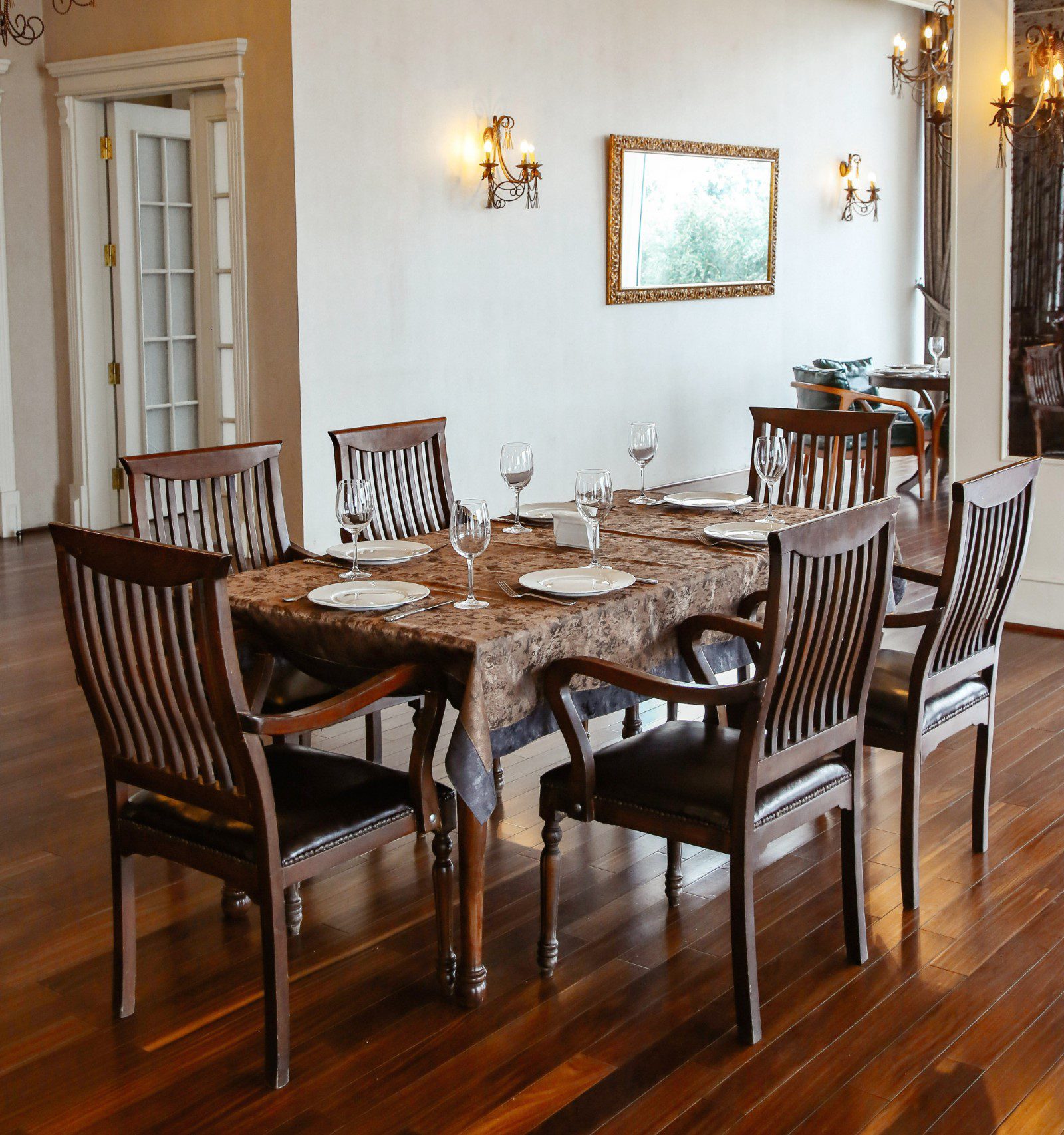 Elegant dining table with six wooden chairs